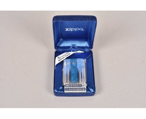 A scarce Zippo Armor Fine Arts Japanese Market Zippo Lighter, dated 2006, with central blue panel flanked by geometric patter