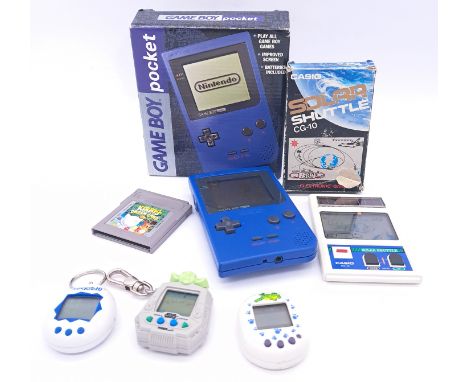 Vintage/Retro Gaming. Nintendo, Casio, Bandai and similar, a boxed and unboxed group comprising of a boxed Nintendo Game Boy 