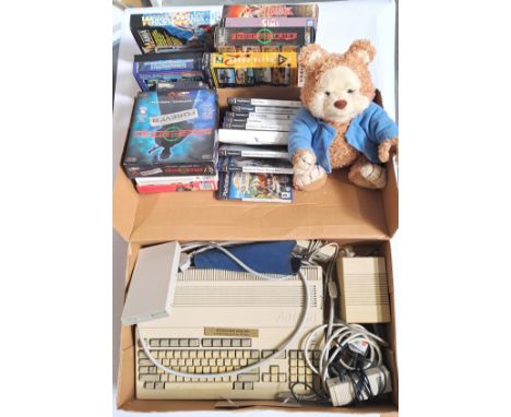 Vintage/Retro Gaming.&nbsp; Commodore, PlayStation and others to include a boxed Commodore Amiga 500 games console and Periph