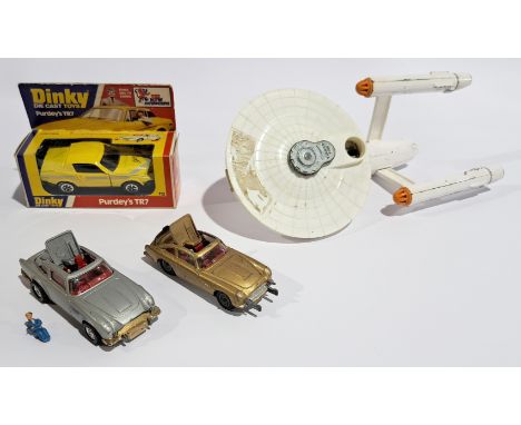 Dinky &amp; Corgi, Film &amp; TV related, a boxed &amp; unboxed group.&nbsp; Includes James Bond 007 Aston Martin (2) Star Tr