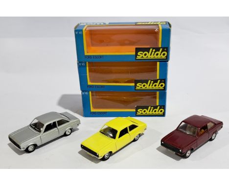 Solido Ford Escort, Silver Yellow &amp; Burgundy, a boxed 1:43 group.  Although unchecked for completeness condition generall