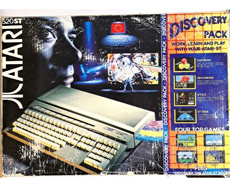 Vintage/Retro Gaming. A boxed Atari 520ST Games Console with Peripherals. Condition appears generally Fair to Good in Good (D