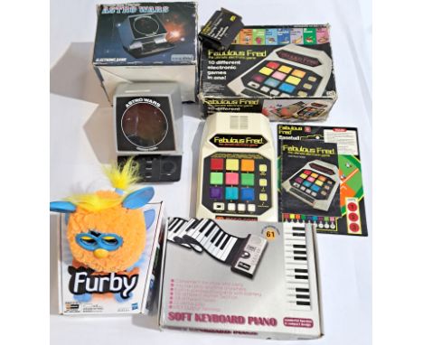 Vintage/Retro Gaming/Electronic. A boxed group comprising of Grandstand "Astro Wars", Electronic Game "Fabulous Fred", Electr