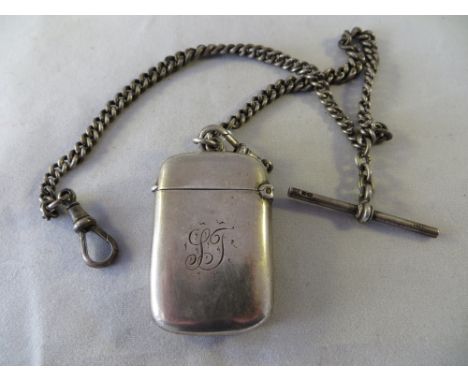 Silver Vesta case. Samuel M Levi, 1913 on a hallmarked silver chain, with hallmarked silver T-bar. Combined gross weight: 51.