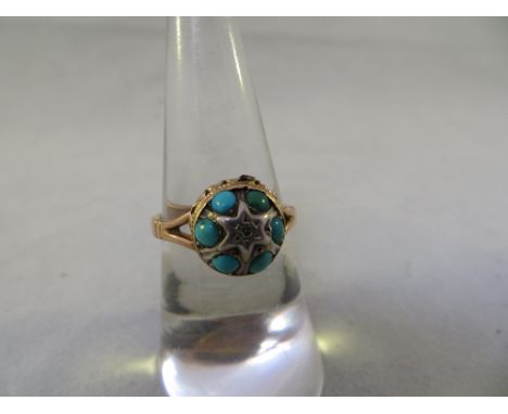 15ct Gold ring with 6 turquoise stones. Size M. Weight 2.7g.
