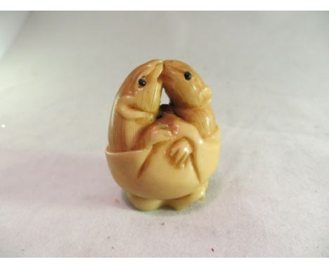 Antique Japanese bone carving of kissing mice (Netsuke style). 