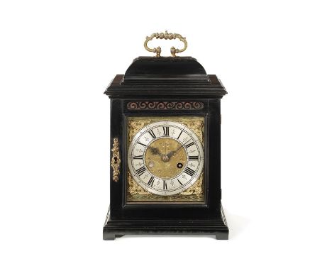 A small Queen Anne ebonised quarter repeating bracket timepiece with calendar by Richard Rooker, London
The caddy top with el