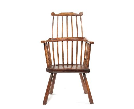 A George III ash stick-back Windsor armchair, probably Welsh
With shaped toprail and three-part arm bow, solid elm plank seat