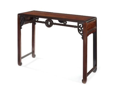 A 19th century Chinese huali centre altar tableThe rectangular top above a pierced roundel and scrolling frieze, on square ta