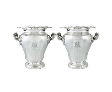 A pair of Old Sheffield Plate wine coolers, circa 1830The detachable cylindrical liners with tinned sides, the fronts engrave