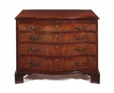 
A George III mahogany serpentine chest possibly by Thomas Chippendale
The rectangular moulded top above a baize lined slide 