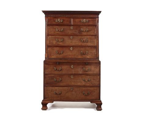 A George III figured mahogany chest on chest attributed to George SpeerThe rectangular Greek key carved cornice with blind fr