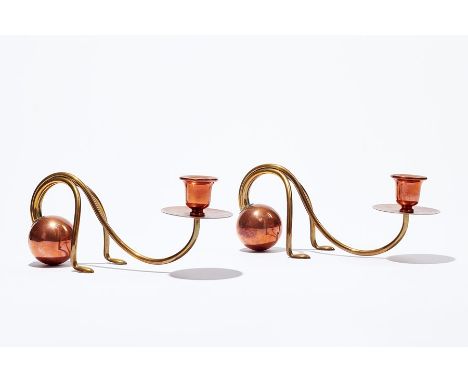 A pair of German Jugendstil (Art Nouveau) copper and brass cantilever candlesticks by Carl Deffner Esslingen, circa 1900, in 