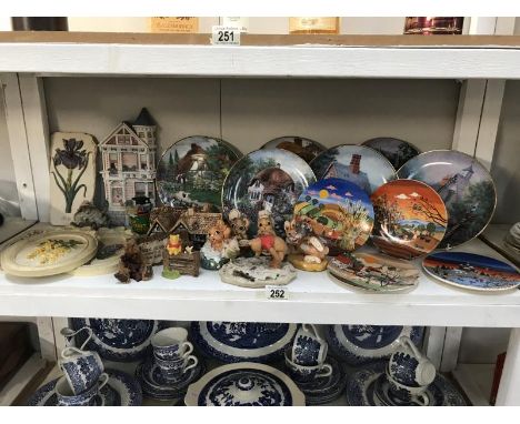 A collection of Lilliput Lane plates, Poole pottery seasons plates, plaques and figurines etc.