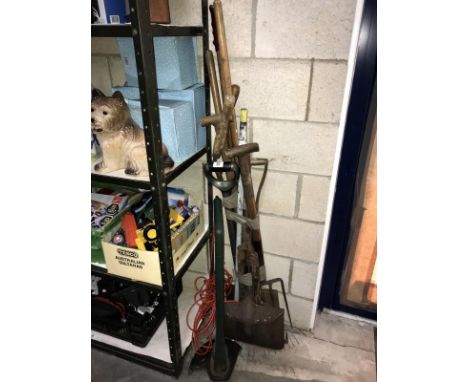 A quantity garden tools and a strimmer