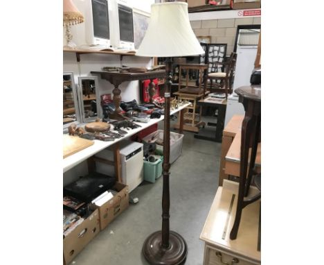 A standard lamp with shade