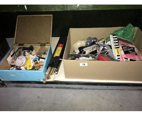 A shelf of vintage sewing and knitting items