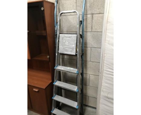 Two sets of step ladders
