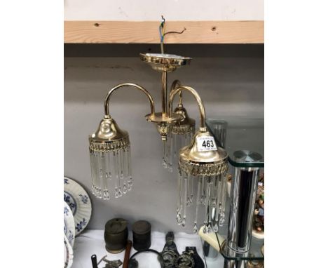 A brass effect 3 arm ceiling light