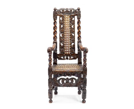 MINIATURE FURNITURE - A carved walnut armchairpossibly late 17th/early 18th century in the Charles II styleThe frames carved 