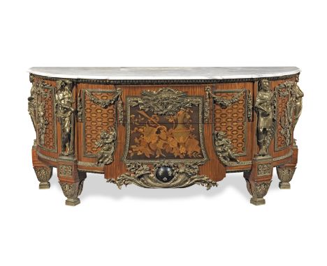 A French late 19th century/early 20th century ormolu mounted bois satine, fruitwood and stained sycamore marquetry commodeaft