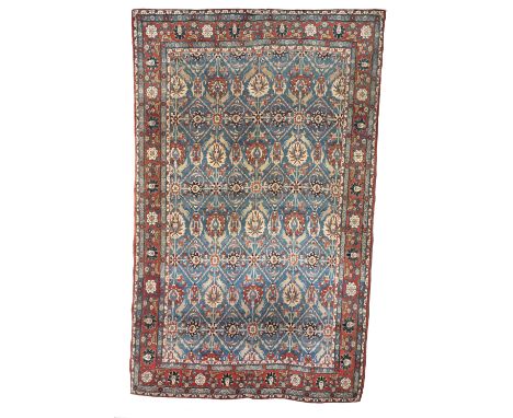 A Fine Veramin carpetc.1920, Persia,with typical floral design consisting robust lotus motifs on an attractive indigo ground,