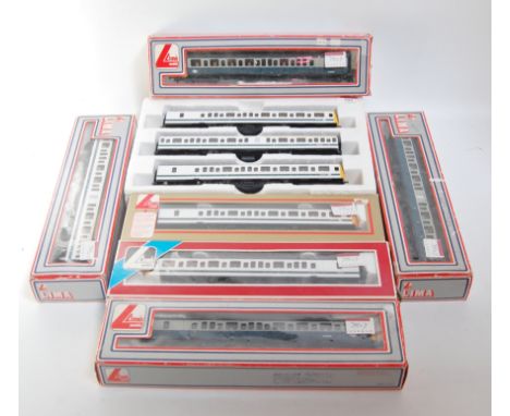 3 Lima class 117 DMUs one blue/grey (G-BG), and another white/blue in box inner packing only (G-BD)