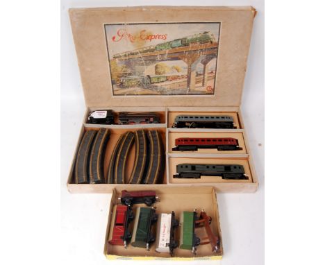 Post war German 'Piko Express' train set containing streamline 0-4-0 engine and tender, 3 coaches and track oval mazac fatigu