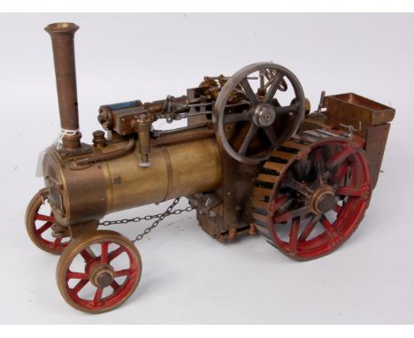 Approx 1 inch scale brass traction engine with single fixed cylinder to drive 3½ inch spoked flywheel, single speed with disp