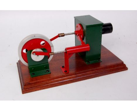 Scratch built possibly from a kit, hot air engine with 3½ inch flywheel on hardwood base to measure 11 inches x 5½ inches app
