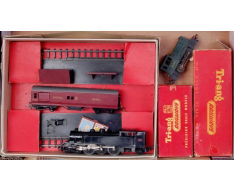 A Triang TC series black 4-6-4 tank engine missing one bogie wheel and both headlights (G-BP) and R559 0-4-0 BR green diesel 