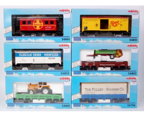 6x Marklin Maxi GI wagons including 'The Fuller-Warren Co' code 54756, low flat with tractor code 54801, low flat with Combin