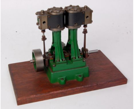 Stuart Turner D10 stationary steam engine, comprising of twin cylinders suspended on A frame supports, with slip eccentric, s