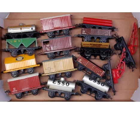 A large tray of 15 postwar Hornby wagons including 2x silver Esso petrol tankers, National Benzole tanker, LMS hopper, Cement