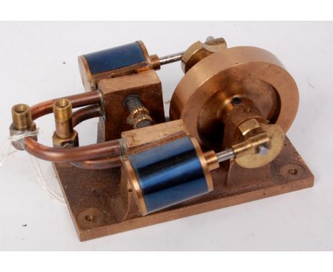 Scratch built from brass horizontal engine with 2 oscillating cylinders, with blued steel housings driving 1¾ inch flywheel w