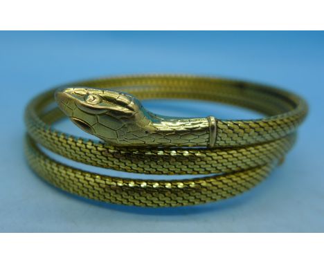 A gold plated snake bangle
