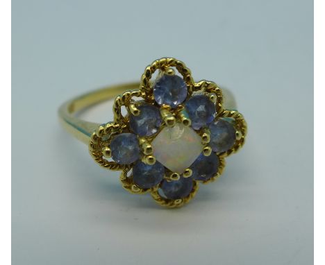 A 9ct gold, opal and tanzanite ring, 3.5g, Q