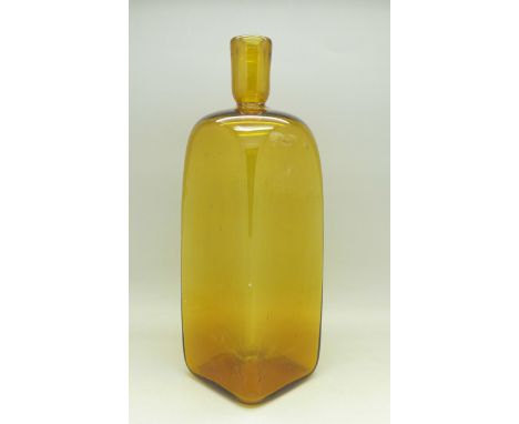 An 18th Century amber coloured glass spirit flask, olive oil sealed to upper receptacle