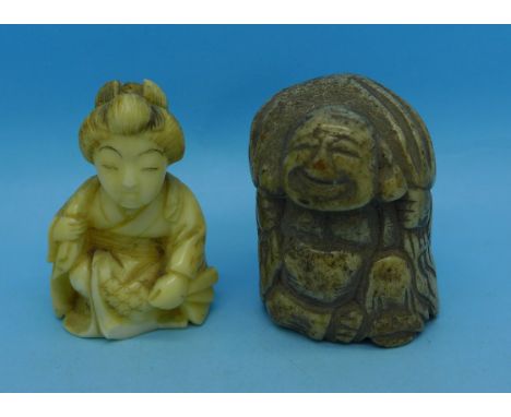 A 19th Century carved antler netsuke and a carved ivory figure of a lady