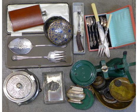 A set of Salter kitchen scales and weights, a hip flask, a plated cigarette box, table lighter and flatware including a pair 