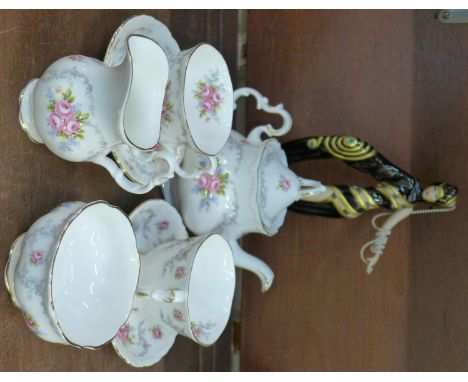 A Royal Albert Tranquillity tea for two tea service and a Franklin Mint Pearls and Emeralds figure