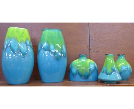 Five Poole pottery blue and green vases, tallest 25cm
