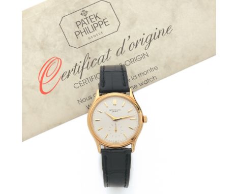 PATEK PHILIPPE CALATRAVA. REF. 3923, VENDUE LE 3 JUILLET 1993 Montre bracelet  en or jaune 18K sur cuir. BOITIER : rond avec 