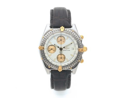 BREITLING CHRONOMAT. REF B13047, Montre bracelet avec chronographe en acier et or jaune 18K sur cuir. BOÎTIER : rond, avec lu