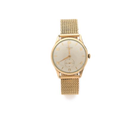 LONGINES Montre bracelet en métal doré sur or jaune 18K. BOÎTIER : rond en métal doré. CADRAN : argenté (piqué) avec index fl