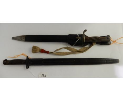 A lot comprising a German bayonet in scabbard with frog, the base marked Weversberg Kirschbaum &amp; C Solingen, 53cm overall