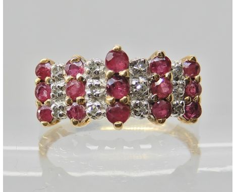 A 9ct ruby and diamond cluster ring size N1/2, weight 2.3gms Condition Report: light general wear. 