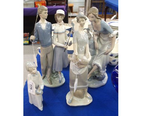 A Lladro figure group of a lady and gent golfers, another of a mother and baby, a Nao figure of woman washing her feet in wat