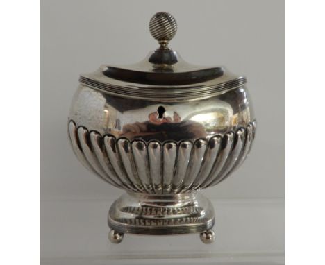 A Continental silver tea caddy, no maker's unidentified hallmark, of rounded rectangular shape with half ribbed body, the hin