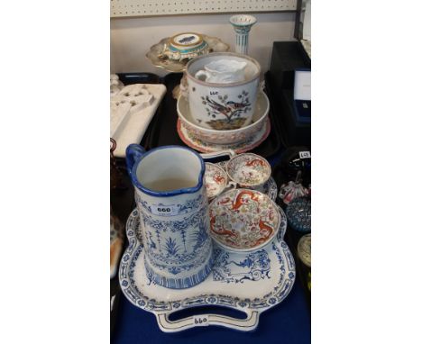 A French blue and white jug and tray, marked Gien to base, a Meissen style column candlestick, a jardiniere with mask handles
